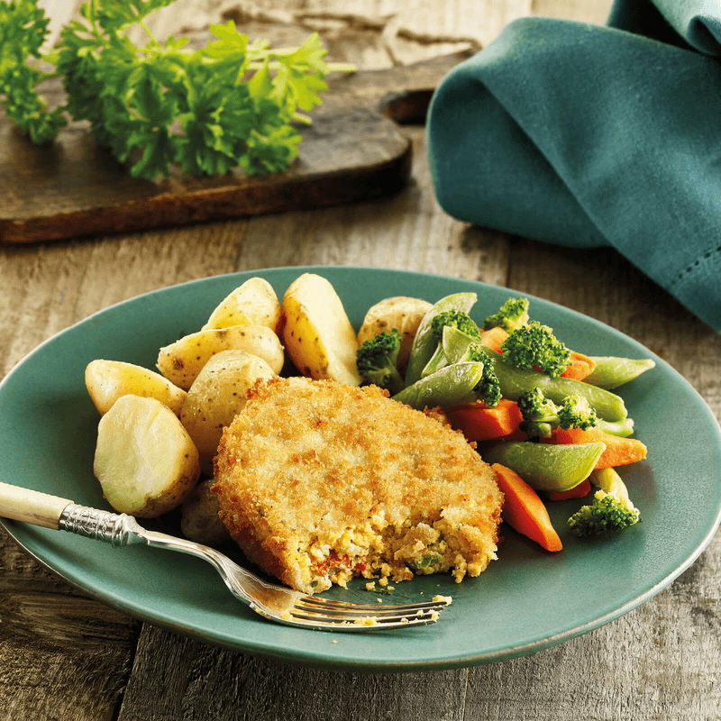 Fishcake with roasted new potatoes and vegetables